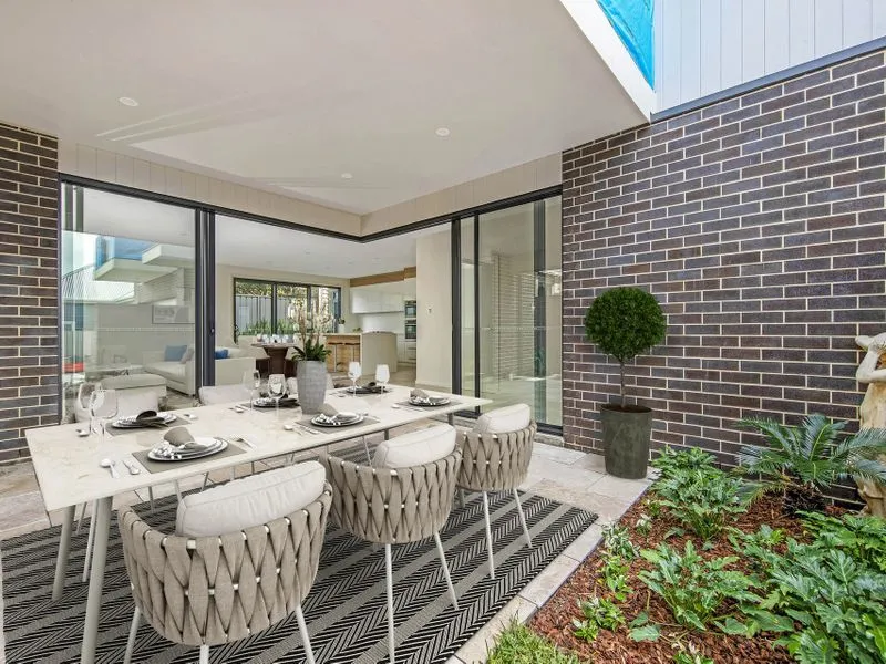 Sophisticated New Home Designed for Beachside Living.