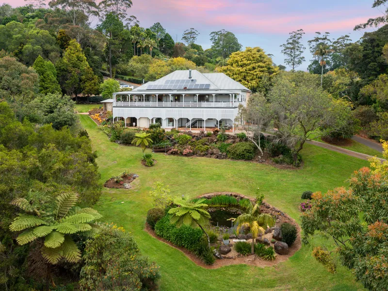 Panoramic Acreage Paradise with a Grand Colonial Homestead