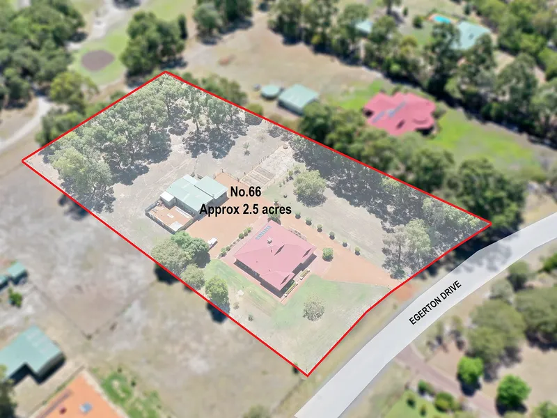 Pristine acreage with plenty of storage for your toys, hobbies or business