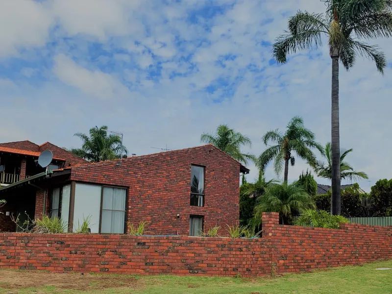 SPLIT LEVEL FAMILY HOME WITH AMPLE PARKING FOR BOAT OR ADDITIONAL CARS