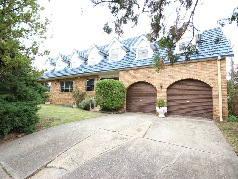 Huge Potential - Live in a Large Comfortable Home or Develop