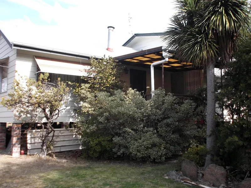 SPACIOUS HOME ON HALF ACRE