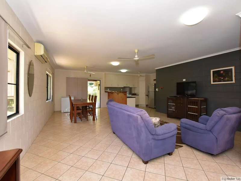 LOW SET THREE BEDROOM HOME WITH A SHED