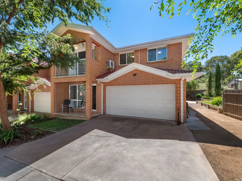 A four-bedroom home 1km from the Gungahlin CBD!