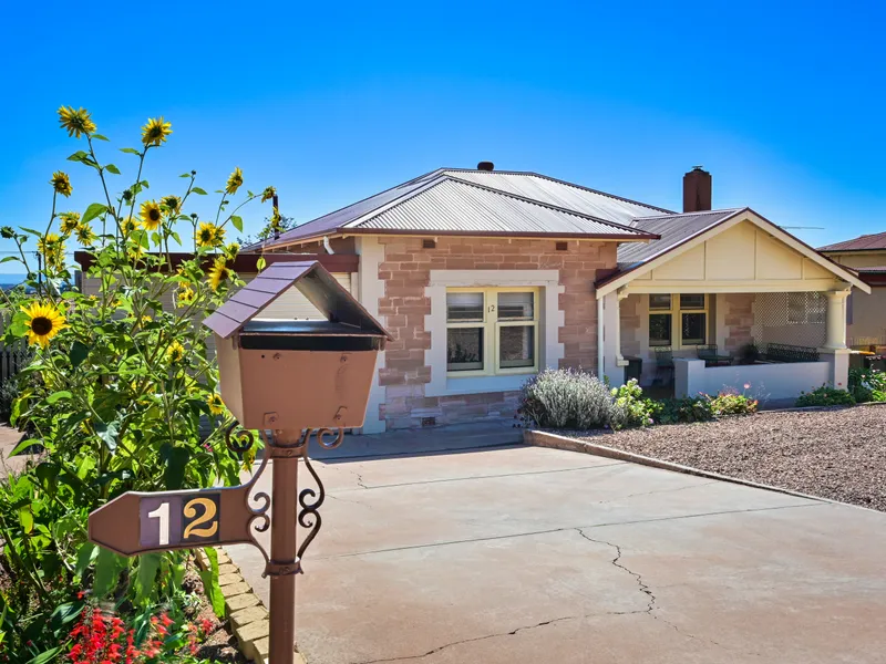 SANDSTONE BUNGALOW STYLE HOME WITH OCEAN VIEWS