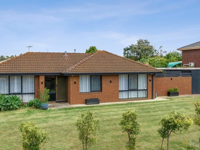 Breezy Family Living With An Impressive Garage!
