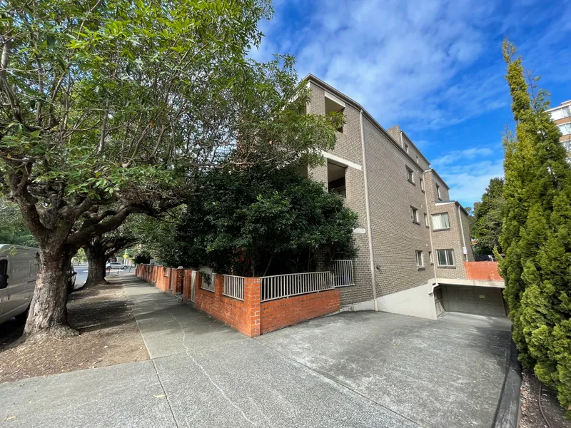 Penthouse style 2 story 2-bedroom apartment with 2 bathrooms & parking in a security building