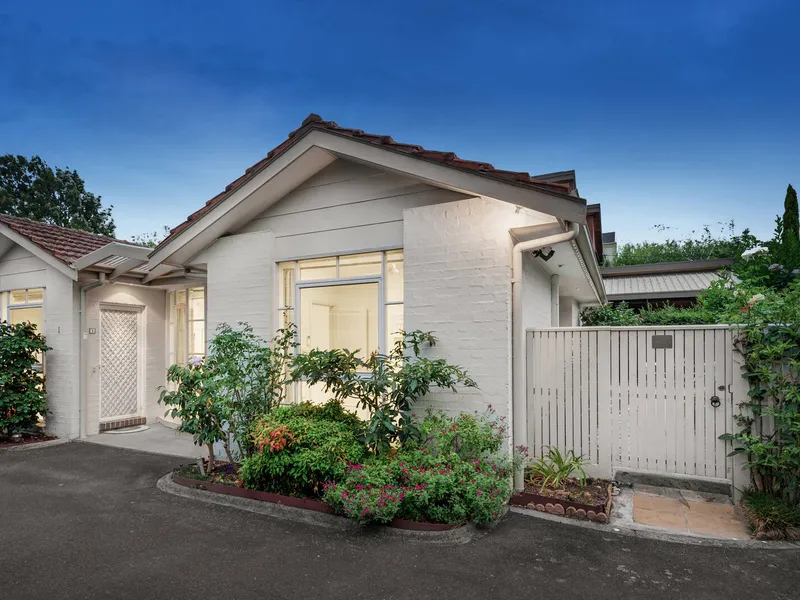 A vibrant garden villa in a prized position