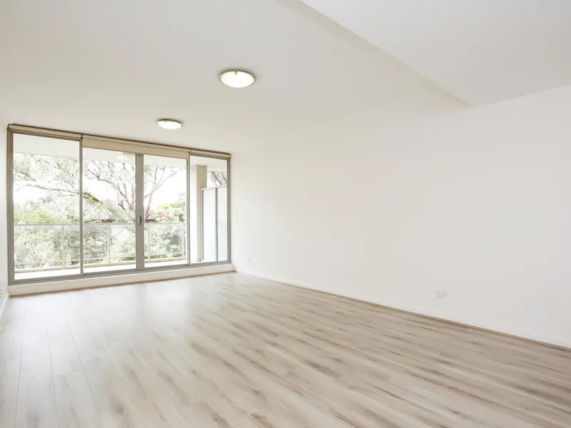 Spacious two story apartment with new timber floors and paint