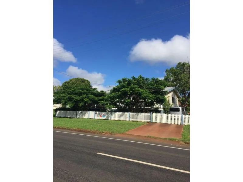 Rural living in small SE Queensland country village. Much love has been put into the garden.