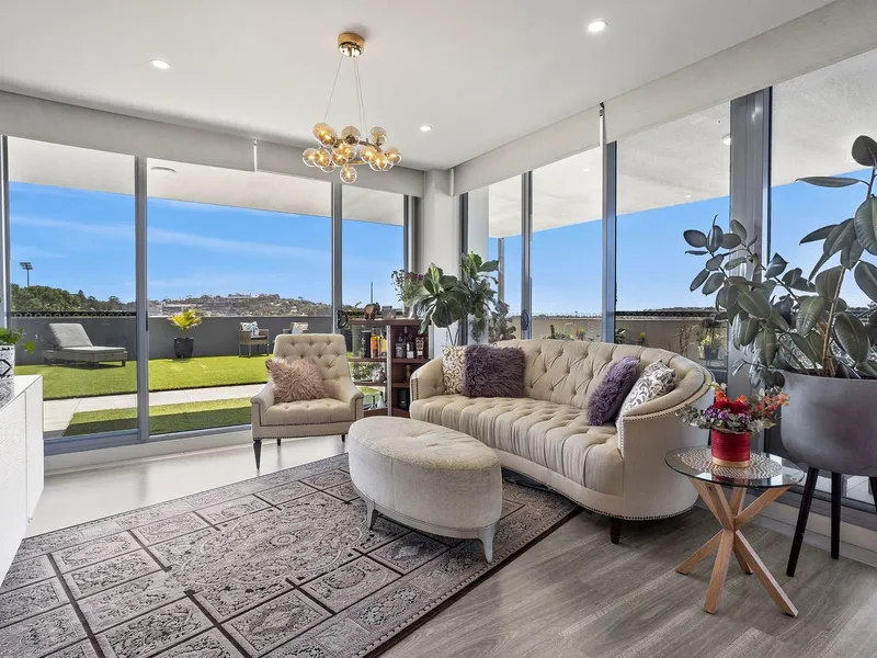 Top-Floor Two-Bedroom Apartment with Expansive Outdoor Entertaining Deck