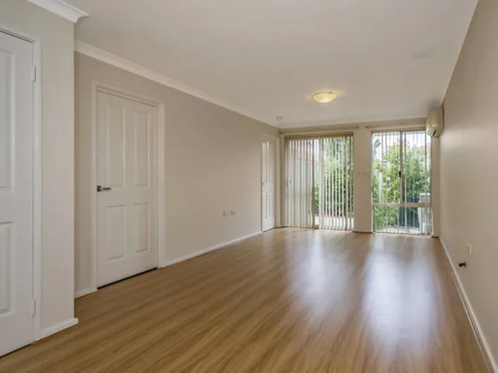 Lovely location, new flooring and blinds.