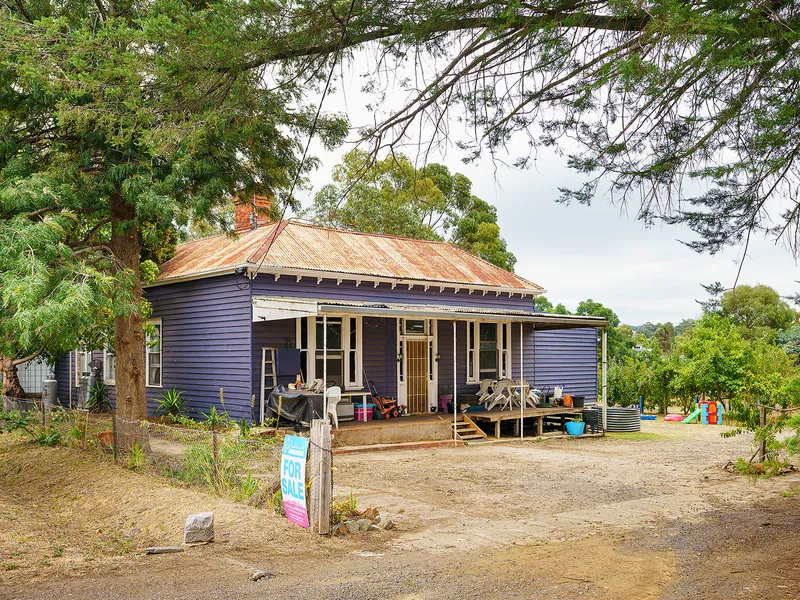 Enjoy the Charm and Character of this large 4-5 bedroom home