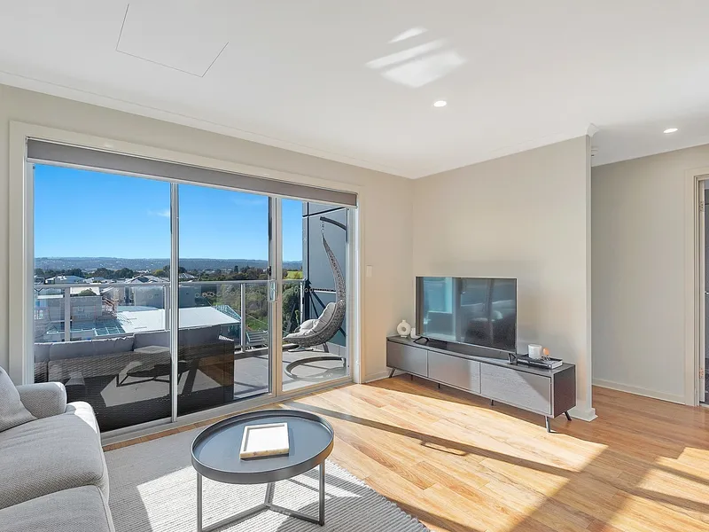 Modern Light Filled Apartment on top floor capturing views to the East and South