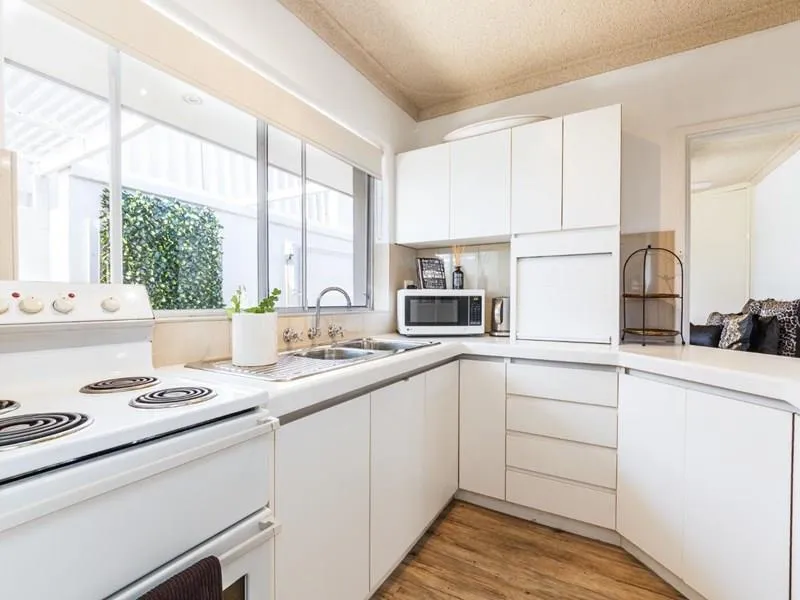 WALK TO THE BEACH FROM THIS REFURBISHED 2 BEDROOM GEM!