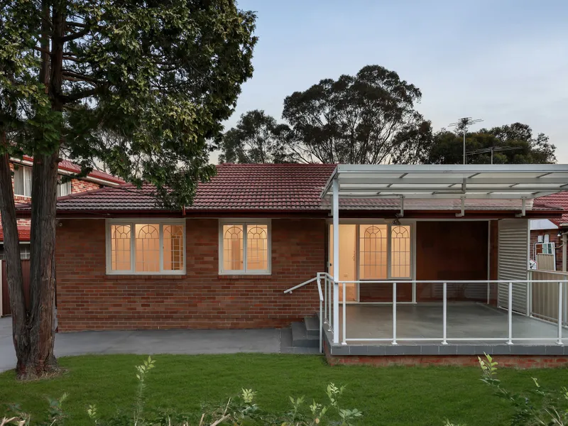 Modern family haven backing onto lush parklands