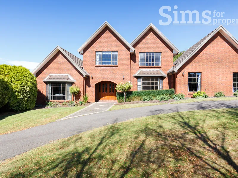 Executive family home with indoor pool and stunning river and mountain views