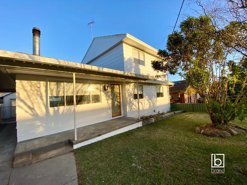 Renovated Home With Refined Wooden Charm
