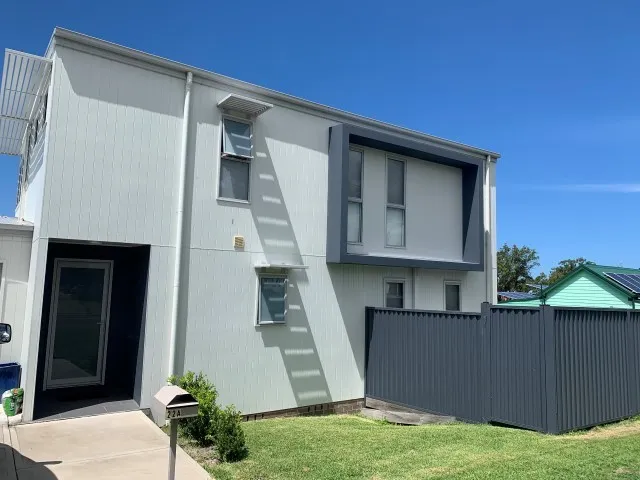 Young, contemporary home with air-conditioned living spaces.