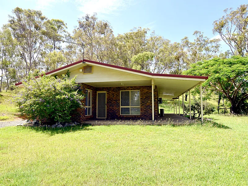 RURAL THREE BEDROOM LOWSET BRICK FAMILY HOME....