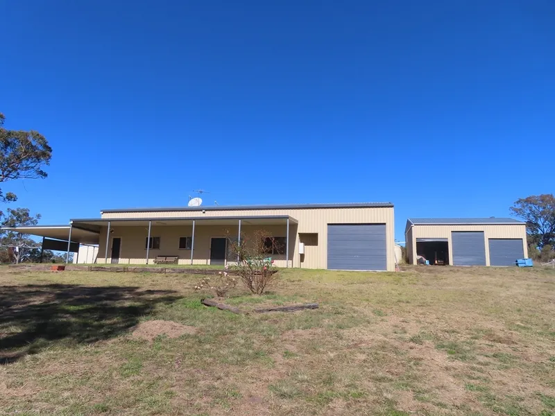 EXCELLENT 243 ACRES WITH HOUSE AND SHEDS