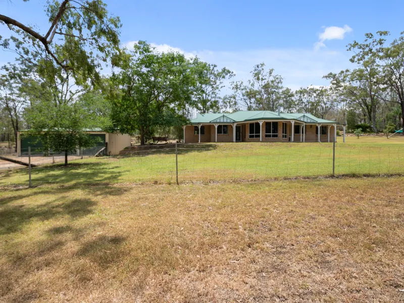 Executive brick residence, Loads of water & featuring a desirable Location.