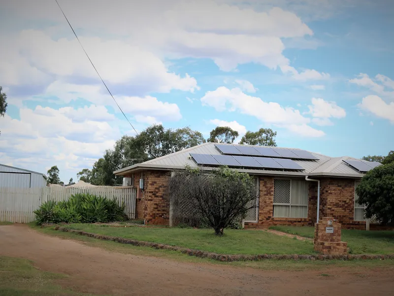 Brick Family Home Featuring 21 Solar Panels and Much More