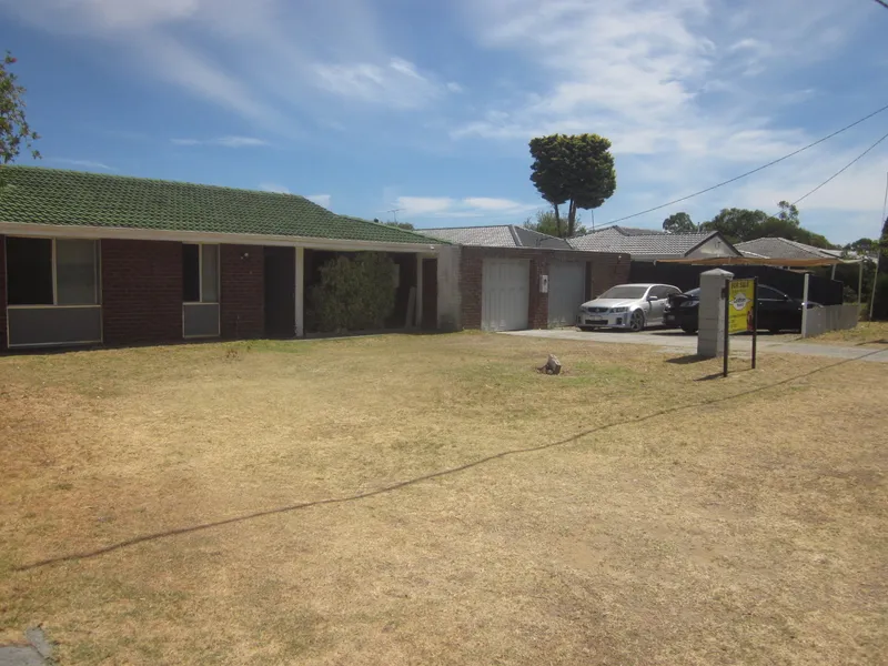 Four Bedroom Home with Loads of Secure Parking... Adjacent to Parkland !