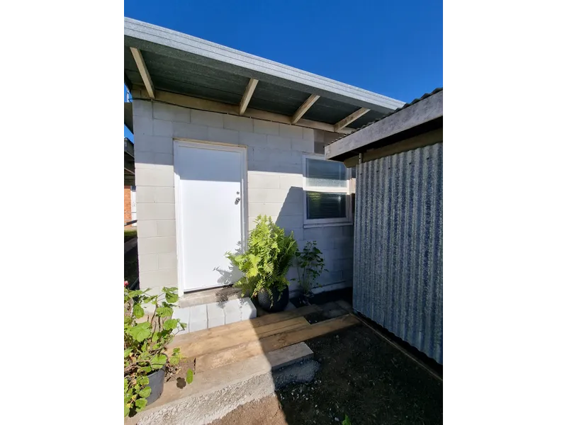 Unit with Fenced backyard..