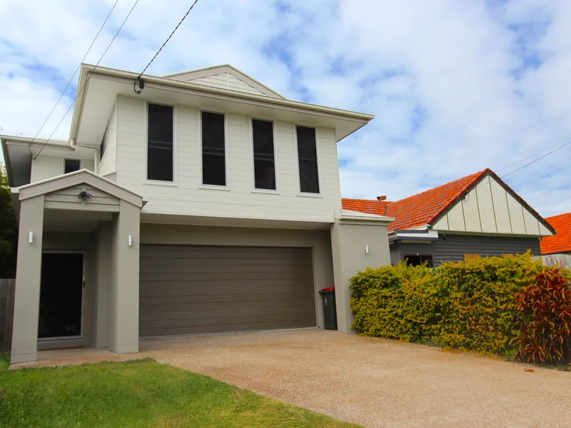 Spacious, Five-Bedroom Family Home in Manly West with Media Room and Ducted A/C!