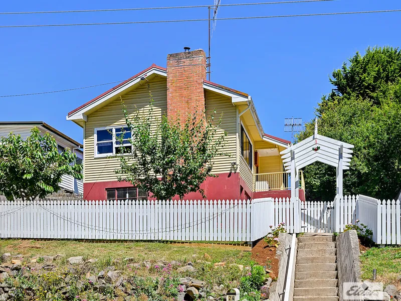 SITTING PRETTY ON THE HILL