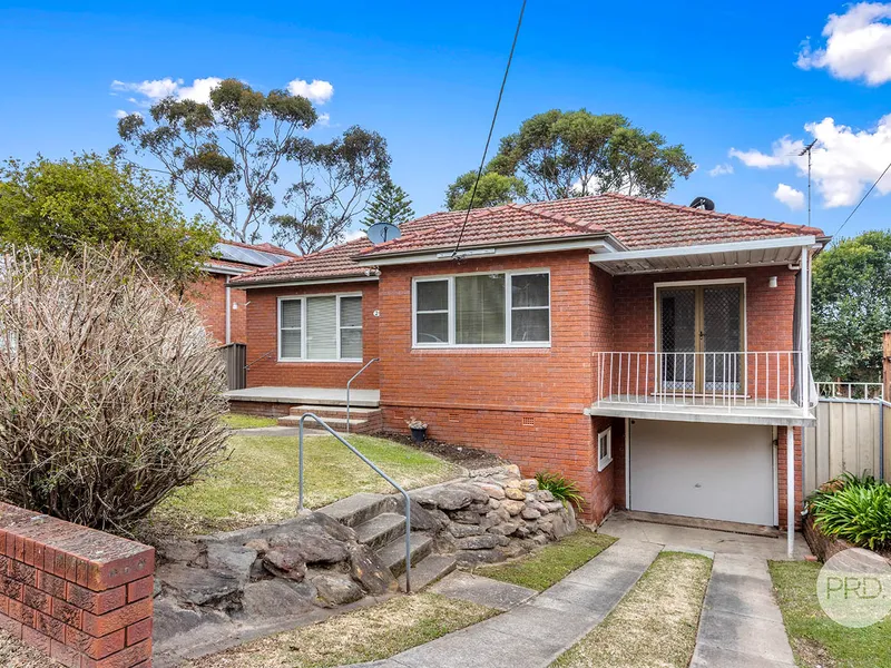 UPDATED FAMILY HOME IN PEACEFUL SETTING