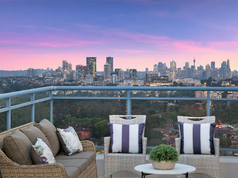 Experience opulence in this luxurious penthouse with magnificent City skyline views and convenience