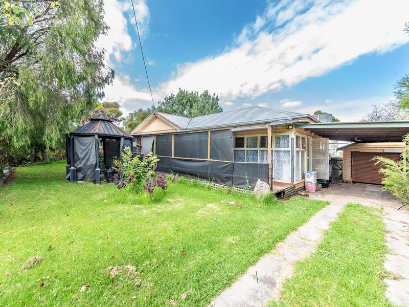 Home on a large residential block