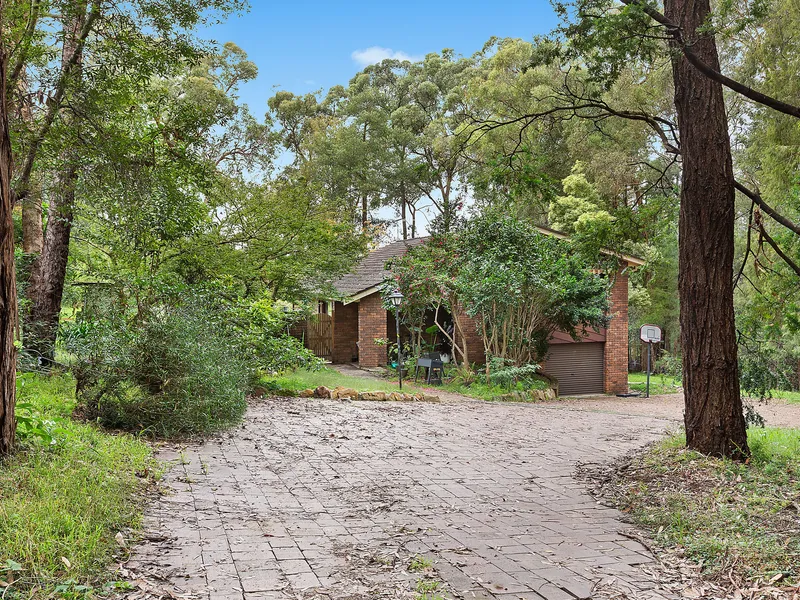 Set privately back from road on huge 7392m2 (approx.) block