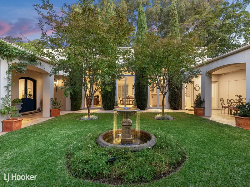 A Mediterranean Inspired Home Boasting a Beautiful Courtyard Garden