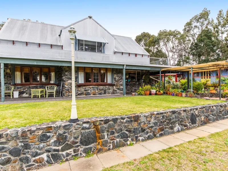 7 ACRES WITH 2 STOREY CHARACTER HOME!