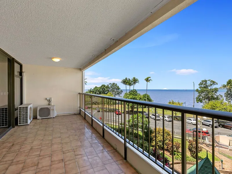 Sit back, relax and enjoy the view from your own apartment within this iconic Cairns City complex.