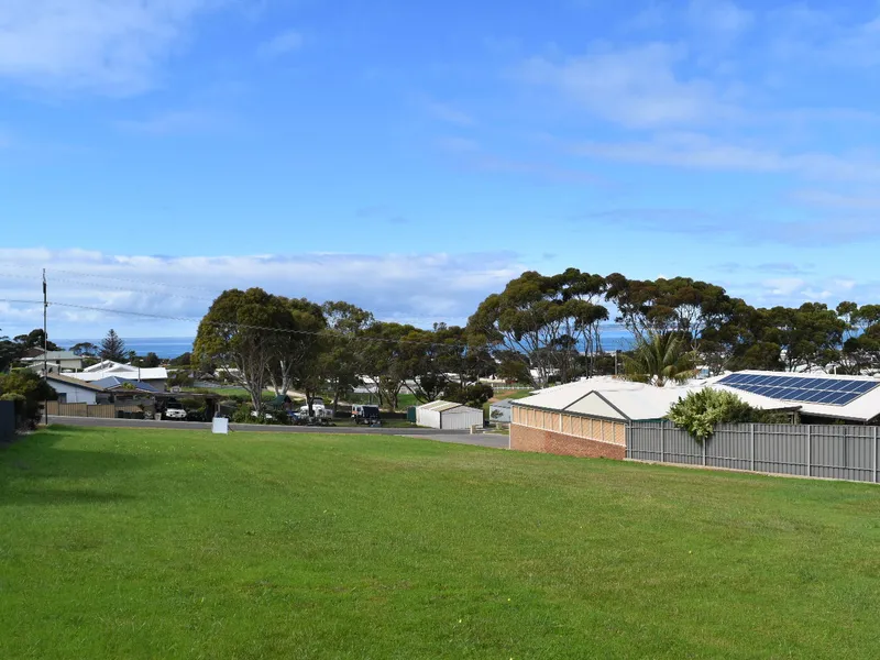 Potential Plus! Spacious, Elevated Land Capturing Seaviews! 