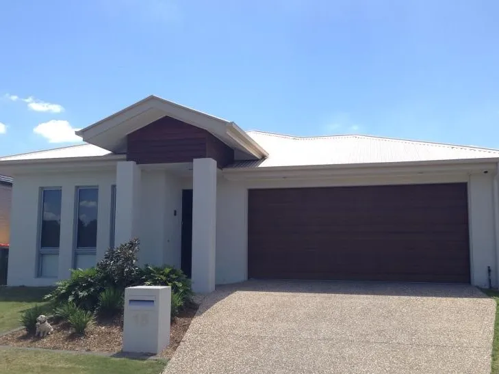 Exceptional fully ducted family home, with several living areas, security system and speakers