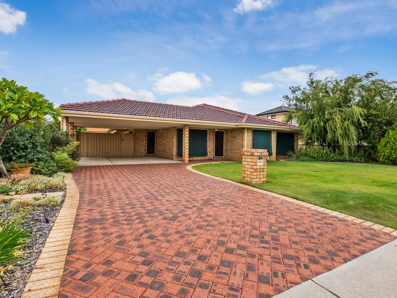 Immaculately maintained family home with sparkling pool