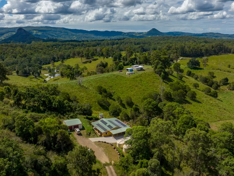 34 ACRES WITH PANORAMIC MOUNTAIN VIEWS + STUDIO + SHED + DAM + CREEK & MORE