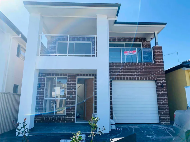 Modern 5 Bedroom Residence, parents or guest room with bathroom downstairs.