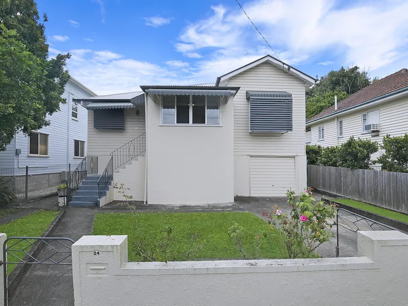 Dual Street Access Character Home with Potential to Renovate!