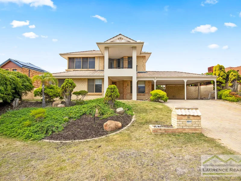 LARGE FAMILY HOME IN A GREAT LOCATION WITH SPARKLING BELOW GROUND POOL