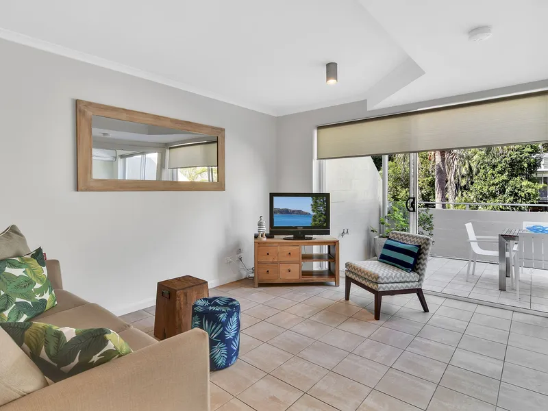 Sun-drenched apartment close to shops and beach.