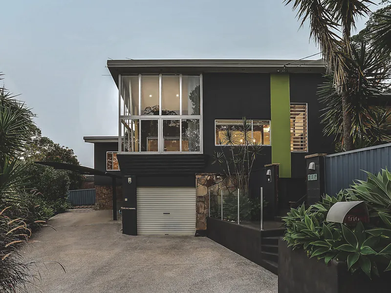 Character filled family home basks in tropical leafy surrounds