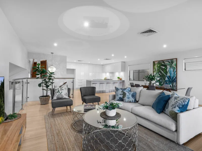 Tri-Level Showpiece with Sweeping Mountain Views