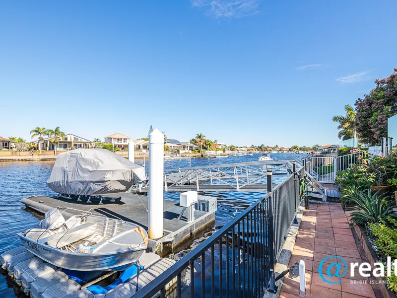 SOUTH FACING RENOVATED CANAL HOME WITH PARKING FOR 4 VEHICLES (TWO CARS, CARAVAN & BOAT/TRAILER)