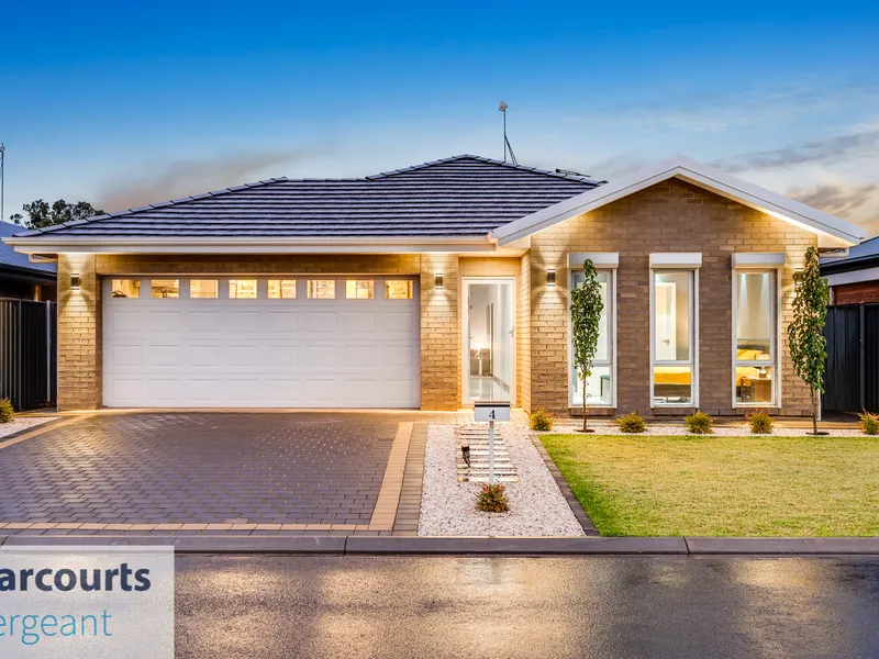 Live luxuriously in this simply exquisite family home!   